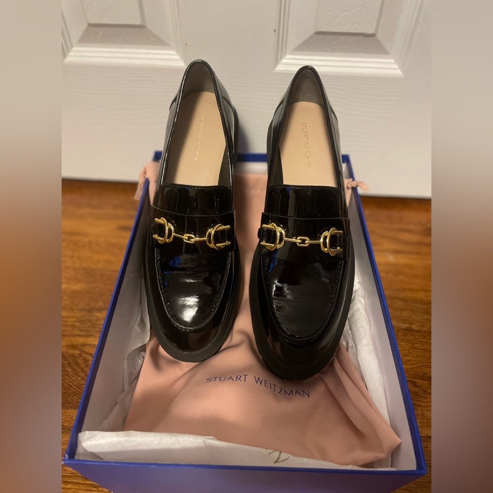 NWT never worn Stuart Weitzman Owen Buckle Ultra Black Patent Leather Loafer.